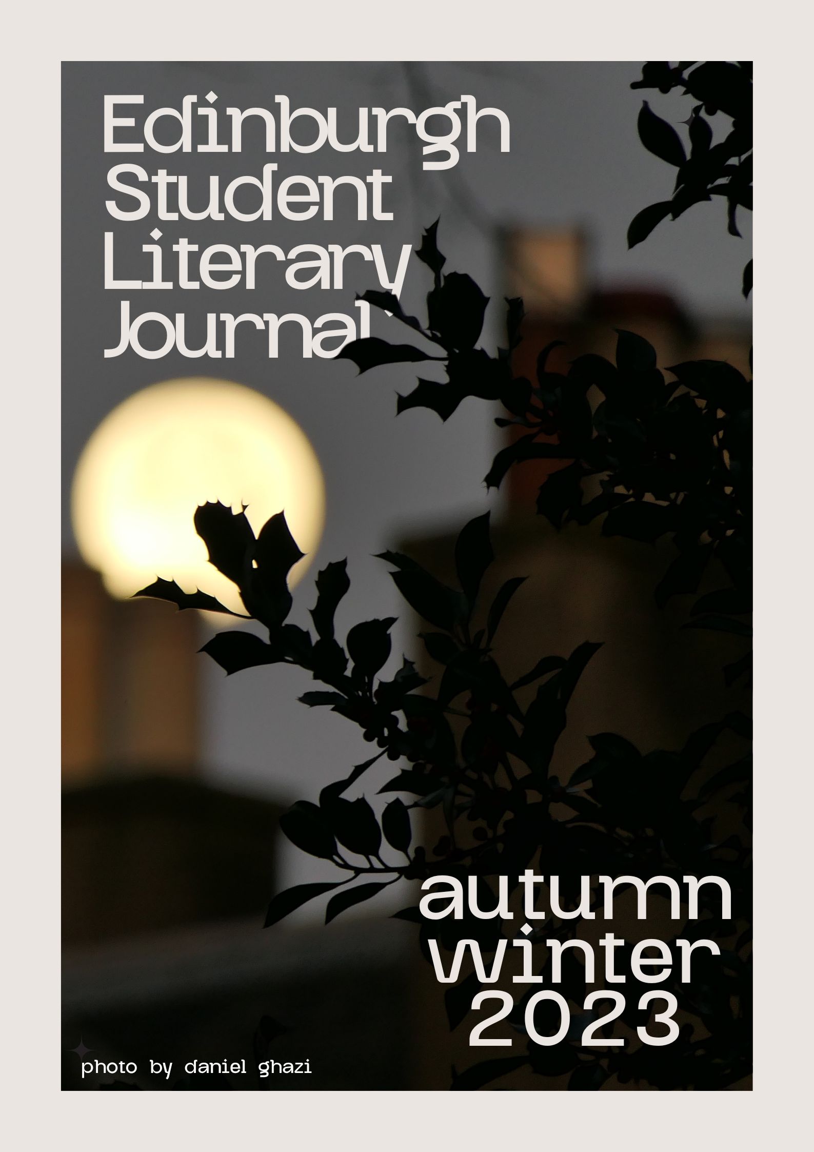 cover for the autumn winter 2023 issue with a photo of holly against a blurred background by Daniel Ghazi