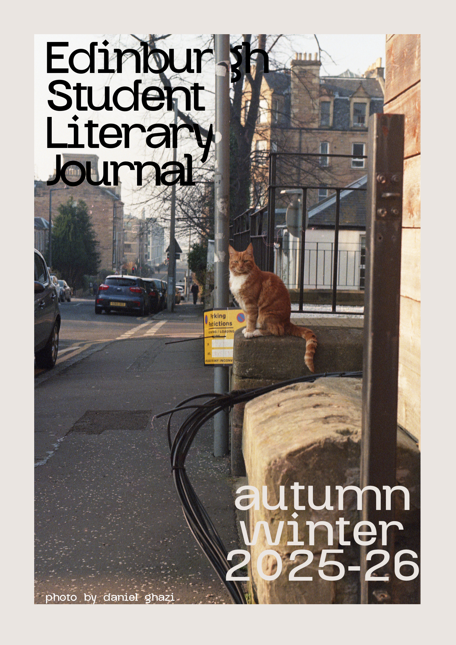 cover for the autumn winter 2025-26 issue with a photo showing an orange cat on a wall by Daniel Ghazi